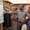 Kenyan family reviewing water usage to choose the right tank size
