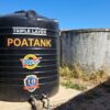 Plastic vs concrete water tanks side by side on a sunny Kenyan compound
